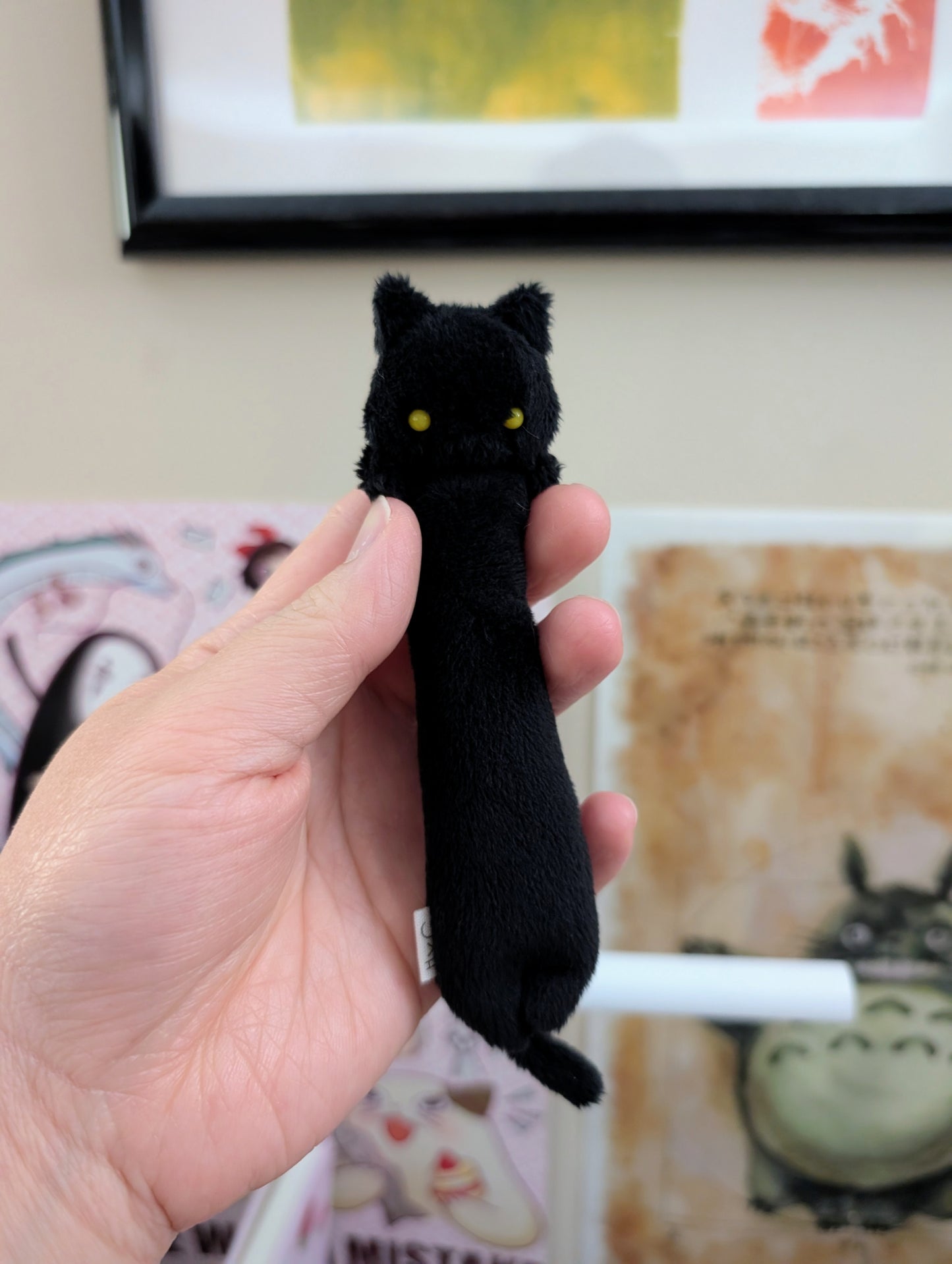 Eclair Black Cat with Yellow Eyes