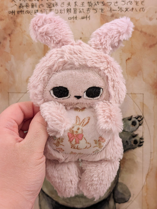 Lil Cuddler Rose Quartz Bun (Left facing)