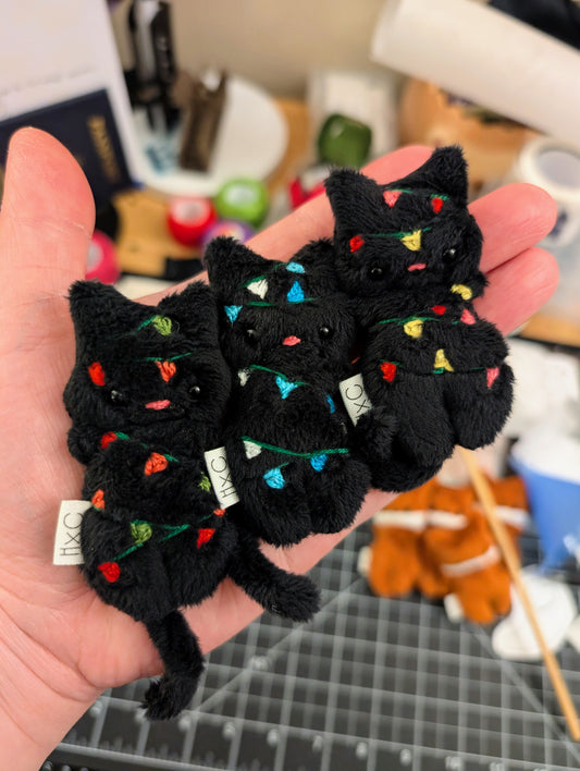 Black Kitty in Xmas Lights