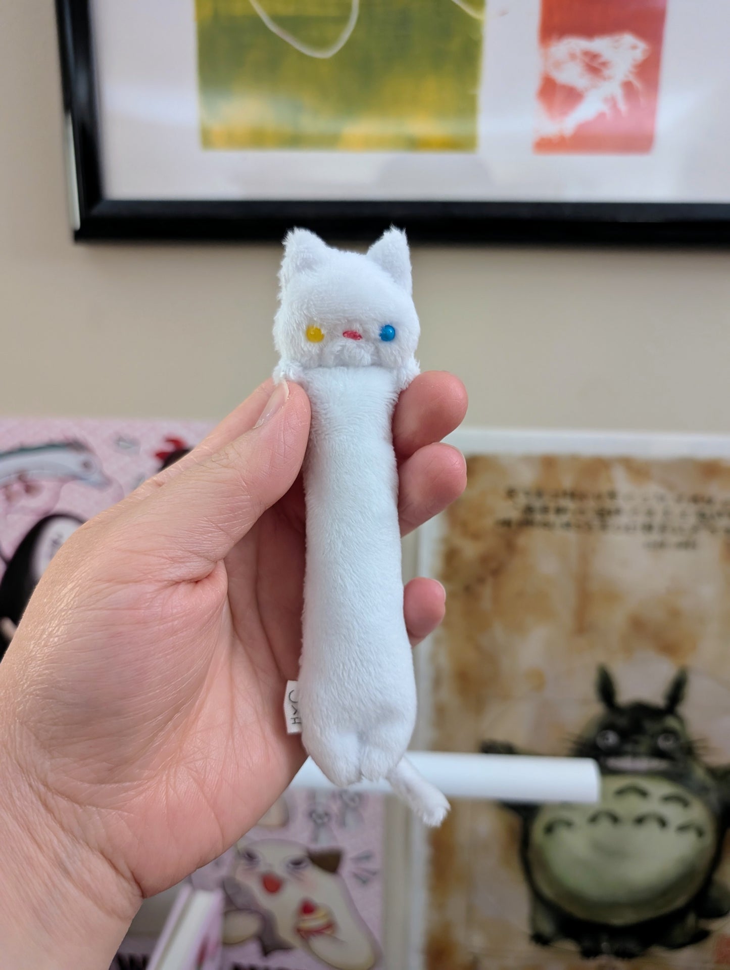 Eclair White Cat with Yellow and Blue Eyes